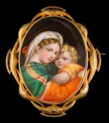 A Meissen porcelain oval portrait brooch depicting the 'Madonna and Child': the oval porcelain