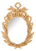 A 19th Century giltwood and gesso oval mirror:, with ribbon tied foliate cresting,