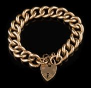 A 9ct gold curb-link bracelet: with 9ct gold padlock clasp and attached safety chain,