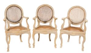 A set of four painted fauteuils in the 18th Century Italian taste:,