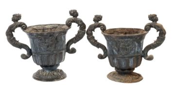 A pair of lead twin-handled garden urns:,
