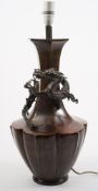 A Chinese bronze vase: of hexagonal and lobed form,