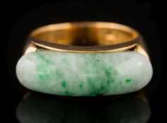 A 22ct gold and jade mounted ring:, 7gms gross weight, ring size N.