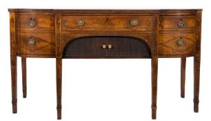 A George III mahogany and inlaid sideboard:, of bowed breakfront outline,
