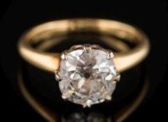 A diamond mounted single-stone ring: with cushion-shaped old brilliant-cut stone approximately 8.