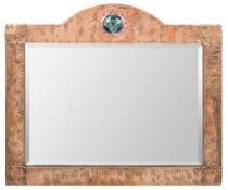 An Arts and Crafts copper and enamel wall mirror: the rectangular mirror plate enclosed within an