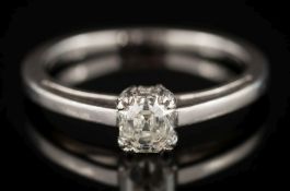 An Asscher-cut diamond solitaire ring: the Asscher-cut diamond 4.3mm long x 3.