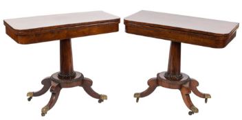 A pair of late Regency rosewood rectangular card tables:,