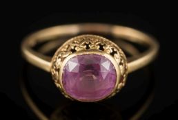 A gold and cushion-shaped synthetic pink sapphire single-stone ring:, ring size P.