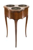 An 18th Century French fruitwood wine cooler:, of trefoil outline,