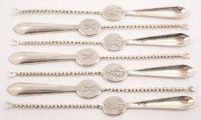 Seven 20th century German silver lobster picks: of traditional design, with spiral twist stems,