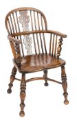 A 19th Century elm, ash and beechwood stick back Windsor elbow chair:,