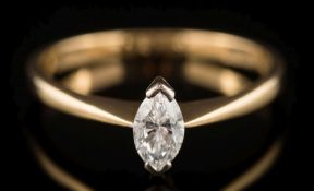 An 18ct gold and marquise-cut diamond single stone ring: estimated to weigh 0.40ct, 2.