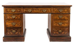 An Edwardian rosewood and marquetry kneehole desk:, the rectangular top with a moulded edge,