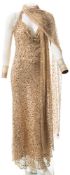 A late 20th century sequined nylon evening dress and shawl:, in beige and gold.