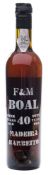 A bottle of Fortnum & Mason Boal 40 year old Madeira port in a wooden case:.