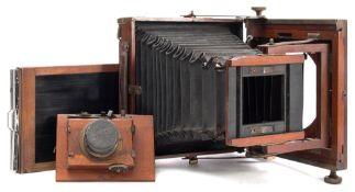 A mahogany three quarter plate camera by Thornton Picard, Altringham:,