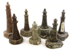 A collection of seventeen various Cornish serpentine model lighthouses:.