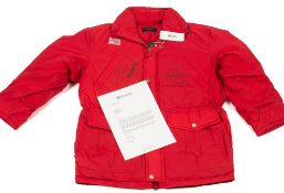 A 1995 Formula One season Mclaren International Team Boss jacket signed by Nigel Mansell and Mikka