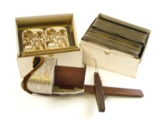 An Underwood & Underwood stereoscopic viewer together with a collection of stereoscopic cards:,