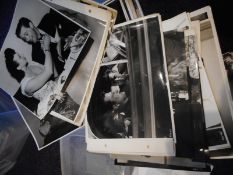 A extensive collection of black and white film publicity photographs and signed postcards mostly