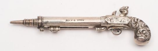 An unusual silver propelling pencil in the form of a flintlock pistol by Samson & Mordan:,
