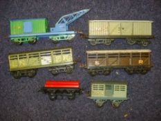 A collection of various unboxed Hornby rolling stock:, including a GWR wagon crane,