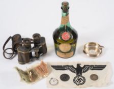 A pair of Carl Zeiss Jena 6x30 binoculars:, together with a WWII period cloth badge,