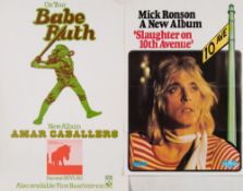 A poster for 'Slaughter on 10th Street ' by Mick Ronson:, together with three posters of John ,
