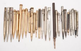 Four silver propelling pencils,