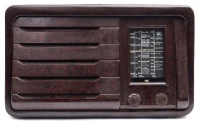 A brown bakelite Model D111 receiver by Masteradio Ltd:,