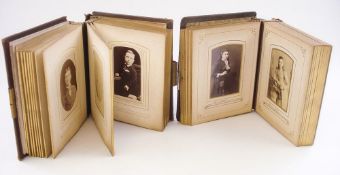 Two late 19th/early 20th century leather carte de visite albums and contents:,