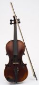 A late 19th century German student violin in case with single bow:, with scrolling head stock,
