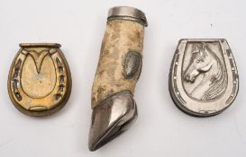 An early 20th century brass horseshoe vesta together with a similar plated example and a plated