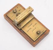 A brass desk model of a 'Patent switch slide chair' by Isca Foundry Co, Newport:. 10cm long.