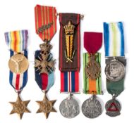 A collection of WWII medals, ribbons and other non service medals:, including a Croix du Guerre.