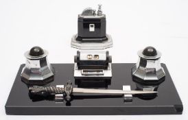 A Ronson Art Deco 'Touch -tip' table lighter together with an Art Deco desk stand:,