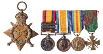 A miniature Queens South Africa group of four and a 1914-15 Star:,