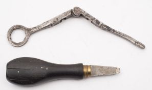 A 19th century steel shot mould and pistol screwdriver:, unsigned.