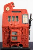 An early 20th century Mills one penny 'one-arm-bandit' fruit machine:,