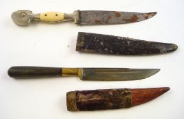 A small Turkish dagger: with 11cm etched bade, and bone slabbed grip,