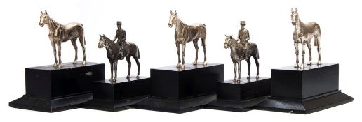 A collection of five silver plated equestrian trophies:, three in the form of a horse ,