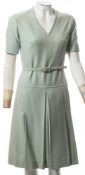 A Christian Dior lime green wool two piece suit:, with white cotton lining,
