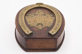 An early 20th century oak and brass mounted horseshoe shaped cribbage board and card box:,