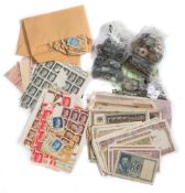 A collection of WWII period bank notes, coins and stamps:,