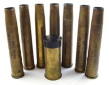 A Hawker Hunter starter cartridge together with seven Bofors 40mm Mk 4 shell casings:.