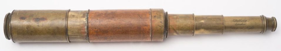 A mahogany and brass three draw 'Day or Night' telescope by Dolland, London:,