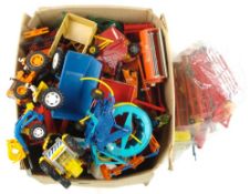 A collection of loose farm vehicles and machinery, Britains and other makes:,