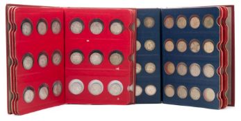 Two coin library albums containing a large collection of UK coinage 2/- to 2/6 from Victoria to