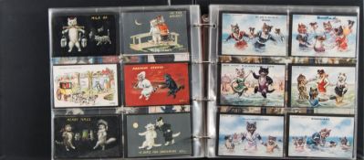An album of Edwardian and later postcards all relating to cats: includes greetings cards,